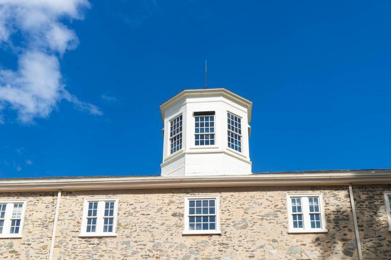 A beautiful blue sky behind the cupola on Founders Hall